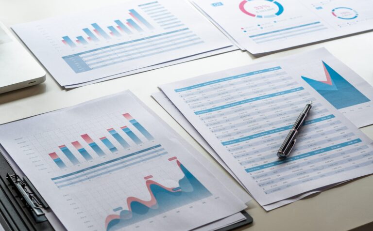 businessman working calculate data document graph chart report m